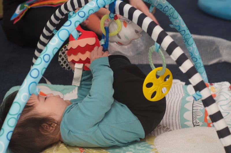 Infant on playmat