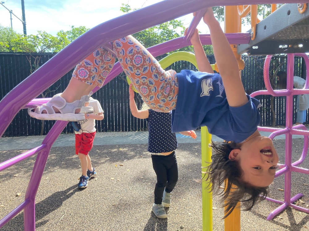 Redwood City girl on climbing frame-1