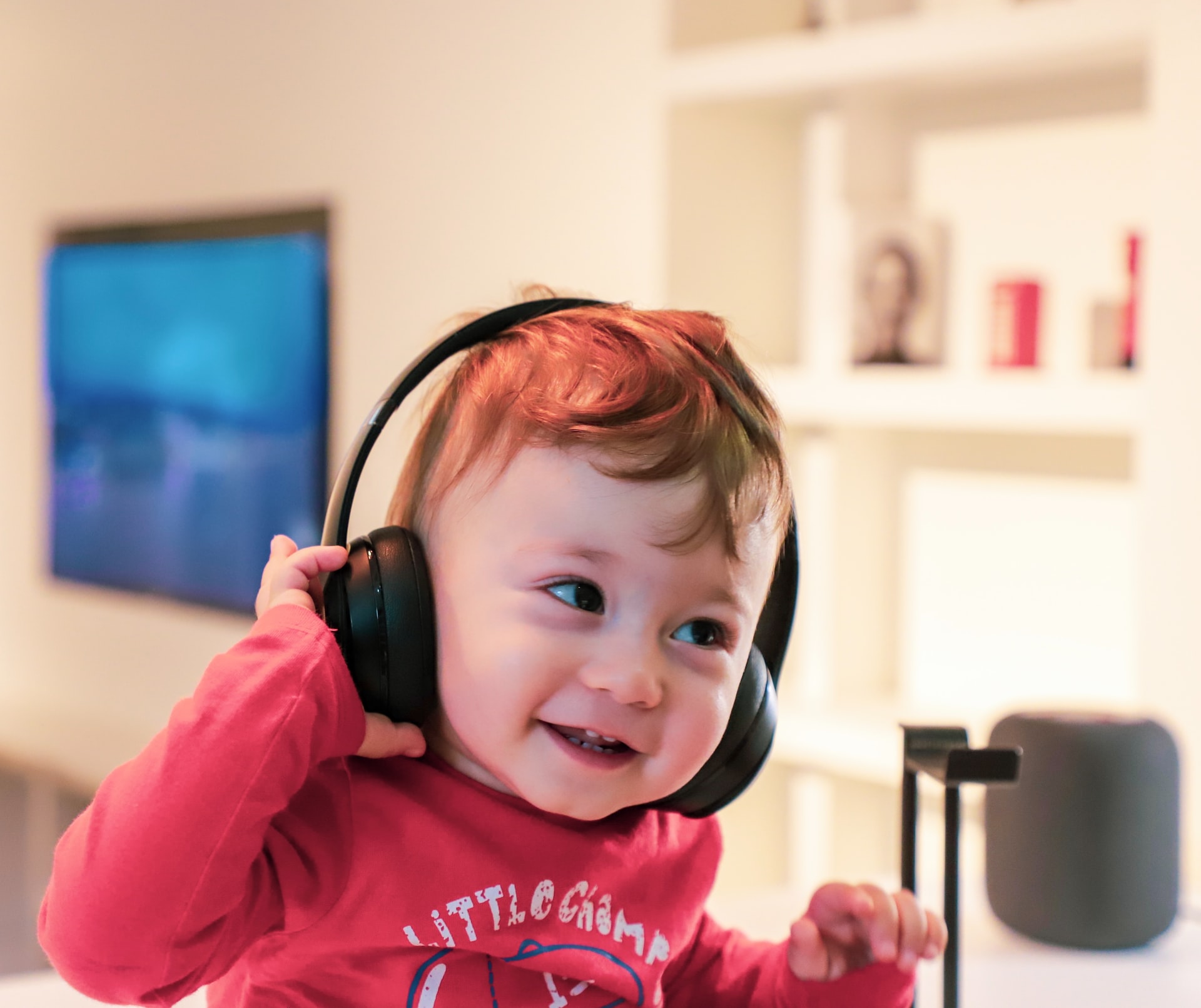 young child with autism wearing sensory headphones