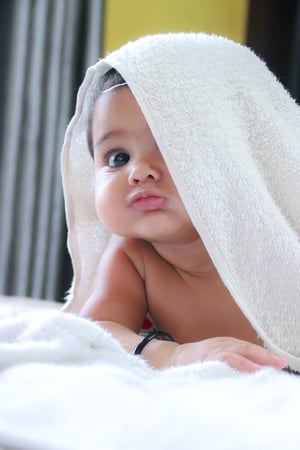 infant doing movement play and tummy time