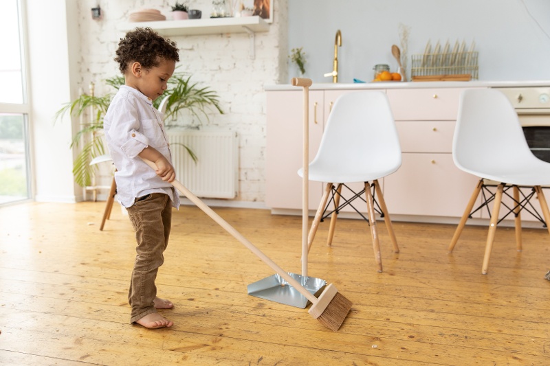 Little boy sweeping