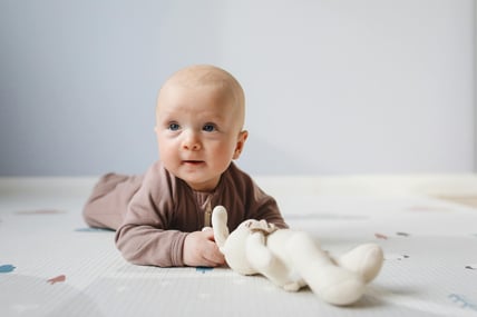 Infant doing tummy time