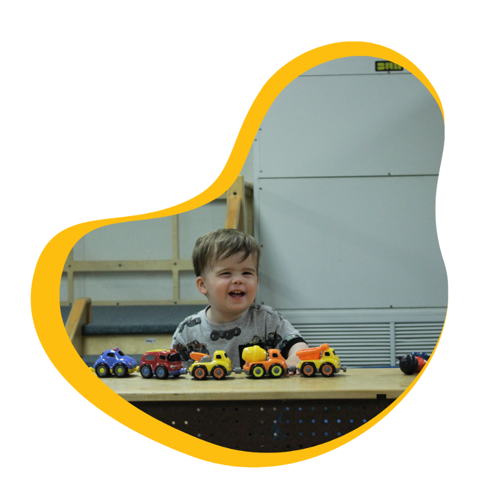 Boy playing at Redwood City Preschool